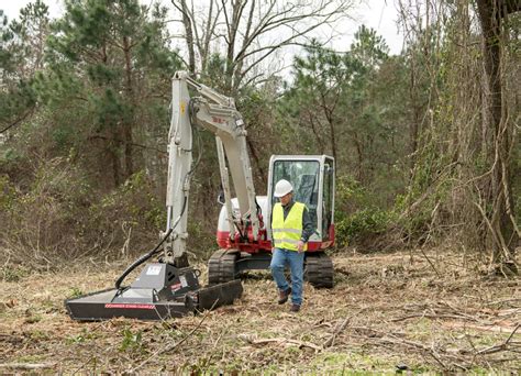 mini excavator brush cutter canada|clearing brush with mini excavator.